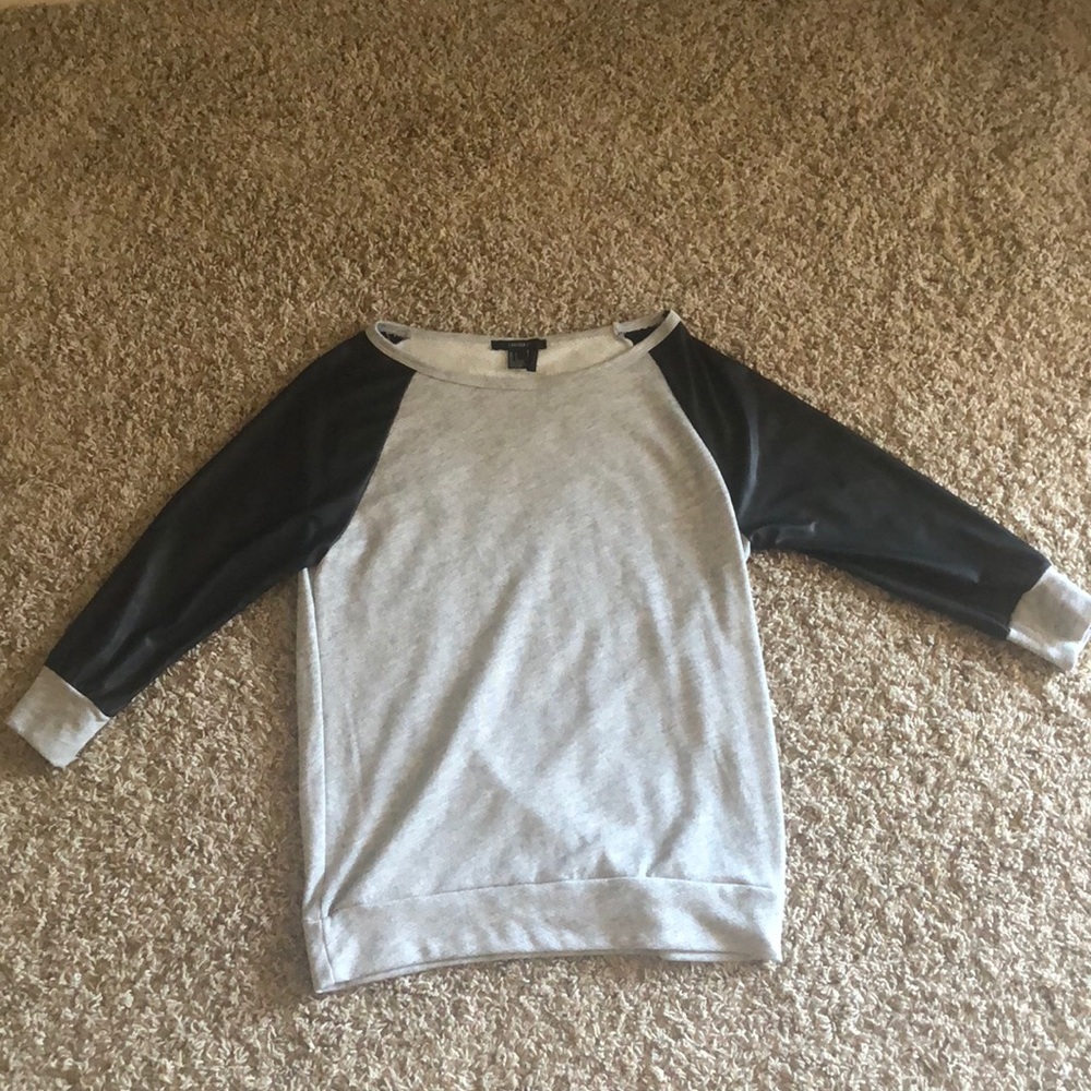 Gray sweater with leather sleeves